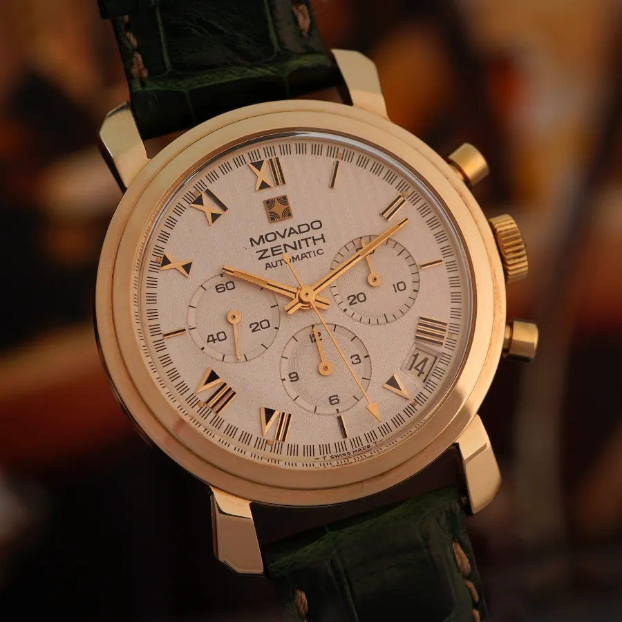 Movado-Zenith El Primero Gold - roman numerals with black inlays