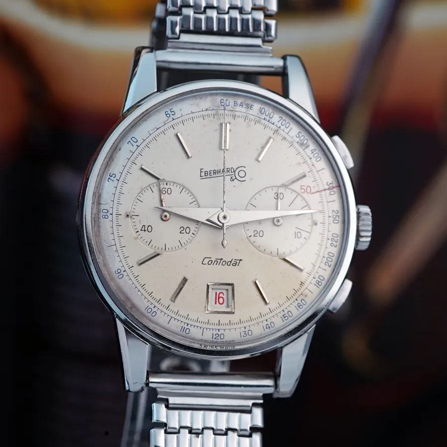 Eberhard Contodat 14900 Roulette Quickset Date - elegantes Silber-Zifferblatt mit blauer Tachymeterlünette