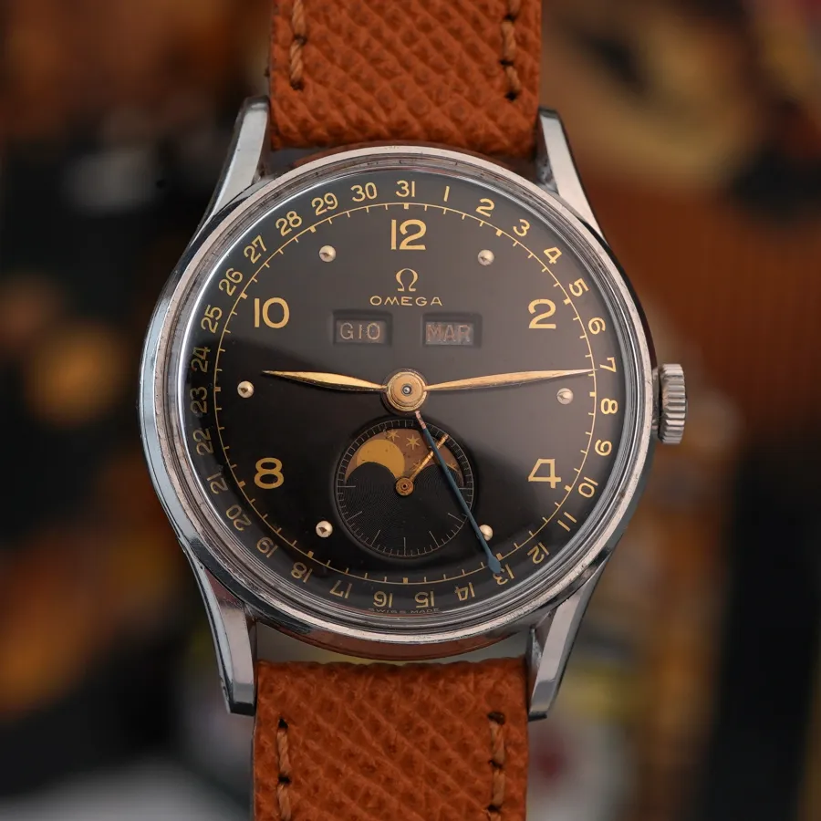 Omega Cosmic Triple Date Moonphase 2471/2 Black Dial - Vollkalender Mondphase Armbanduhr aus den 1940er Jahren
