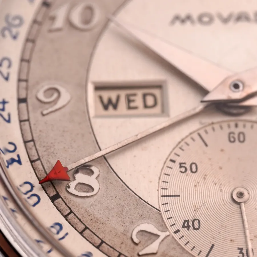 Movado Calendograph 14820 Triple Calendar - red triangle display the date at the outer edge of the dial