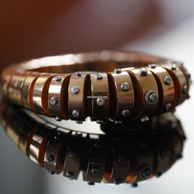 Movado Octopus - Rotgold Armreifuhr